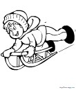 un enfant sur une luge