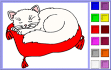 chat sur son coussin rouge
